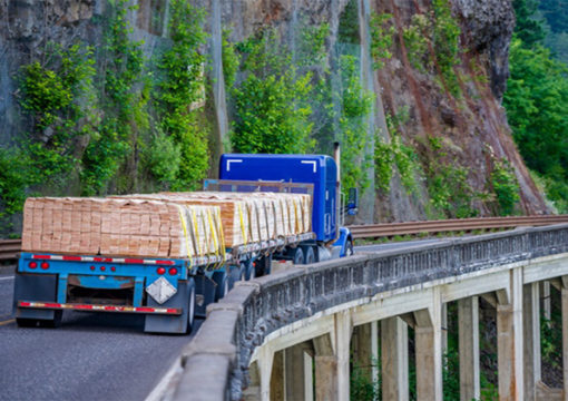 A truck driving through mountains
